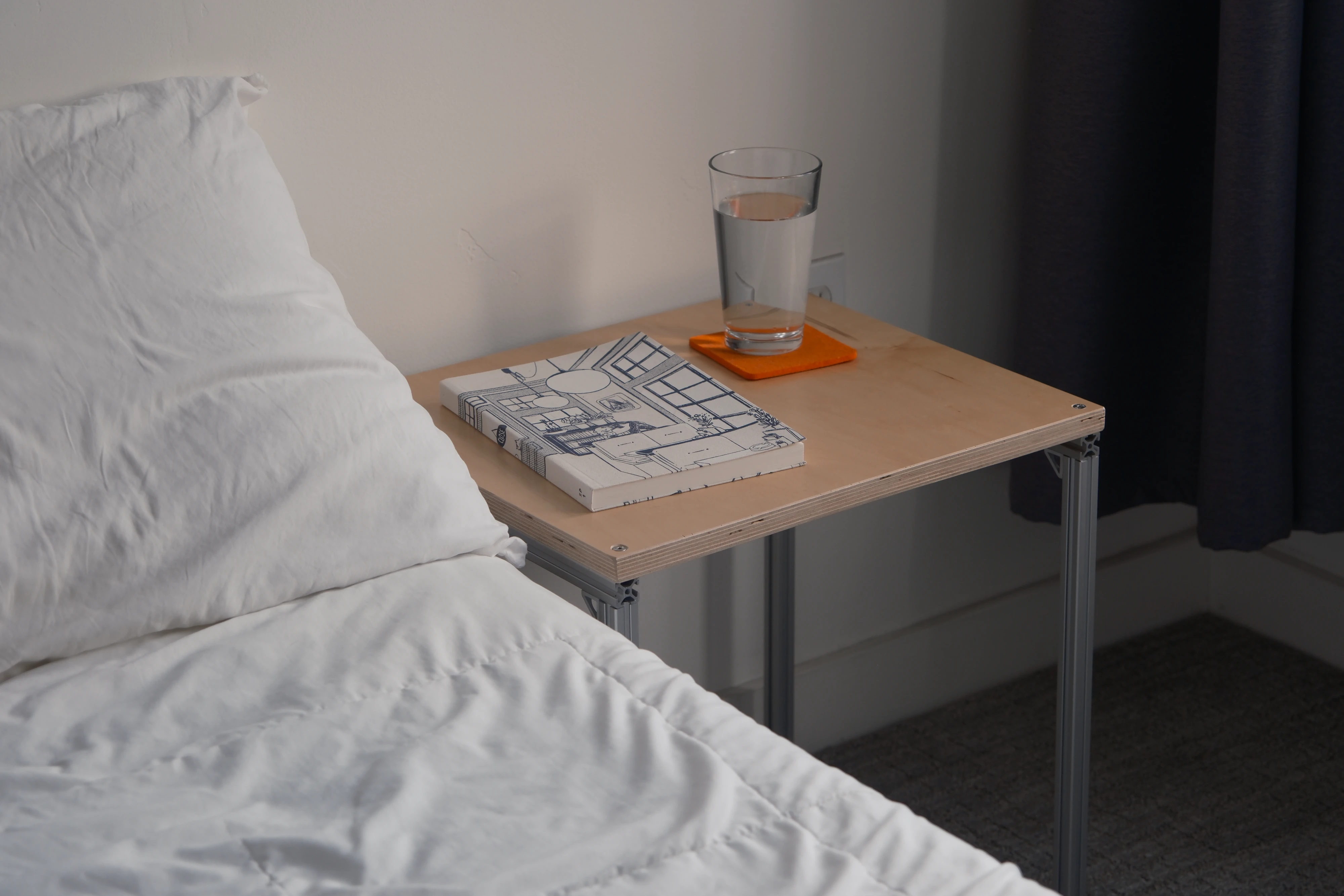 The night table next to a bed